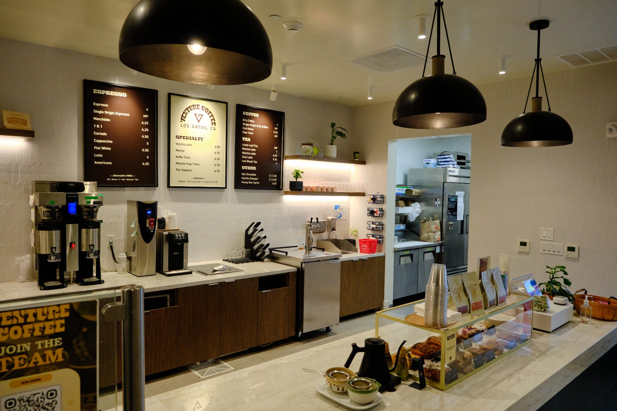 Venture Christian Church Coffee House, coffee counter with menu boards and pendant lights