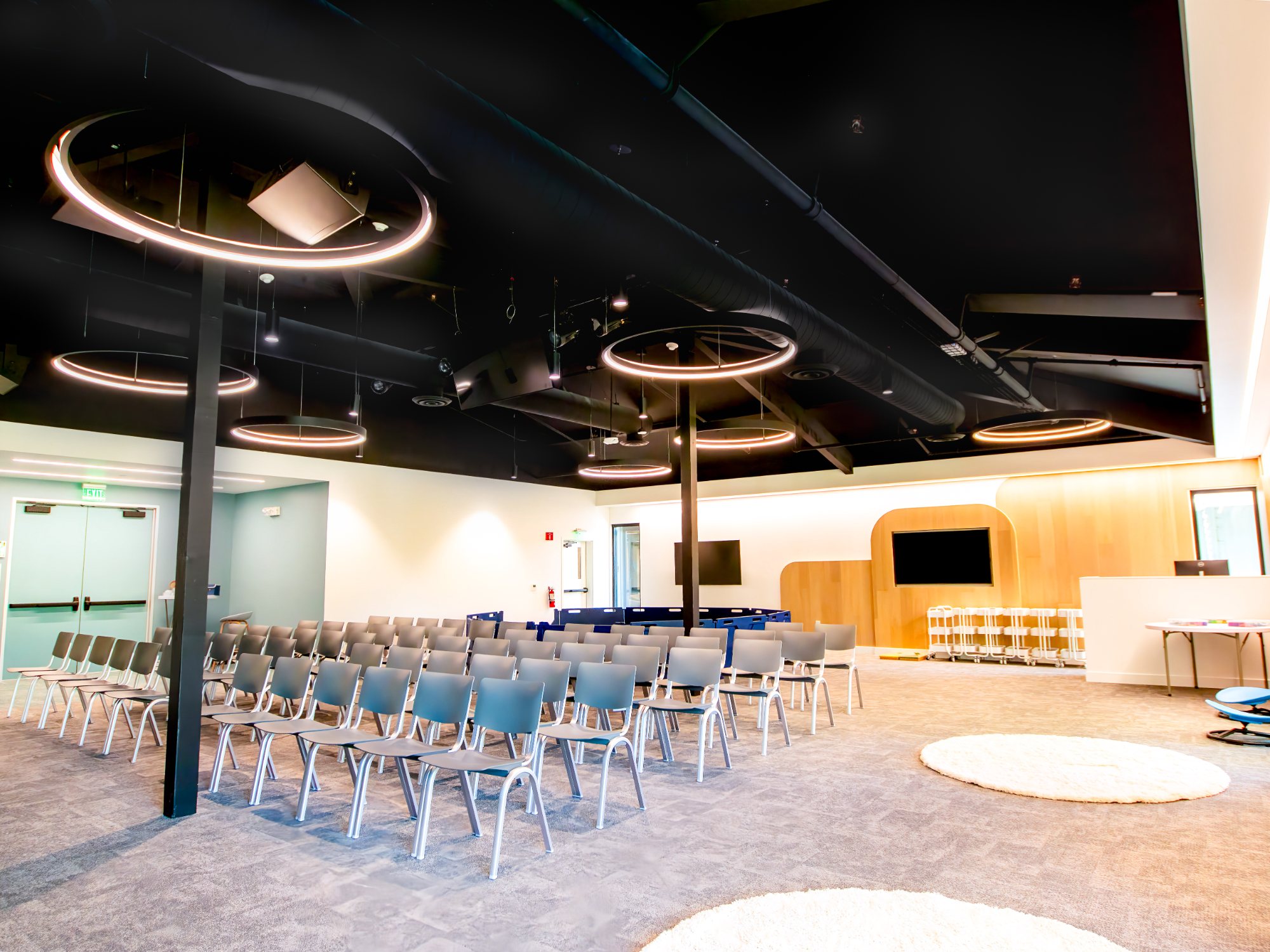 Venture Christian Church Kids Area, large group room set for service