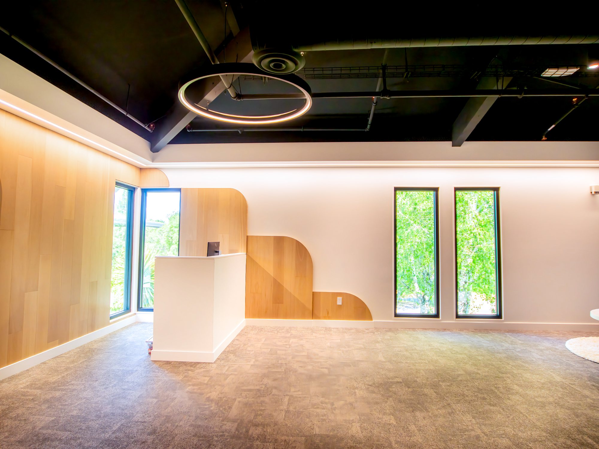 Venture Christian Church Kids Area, welcome desk with wood wall panels